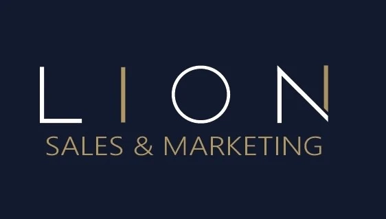 Redesigned LION wordmark with fine white lettering and gold accents on navy