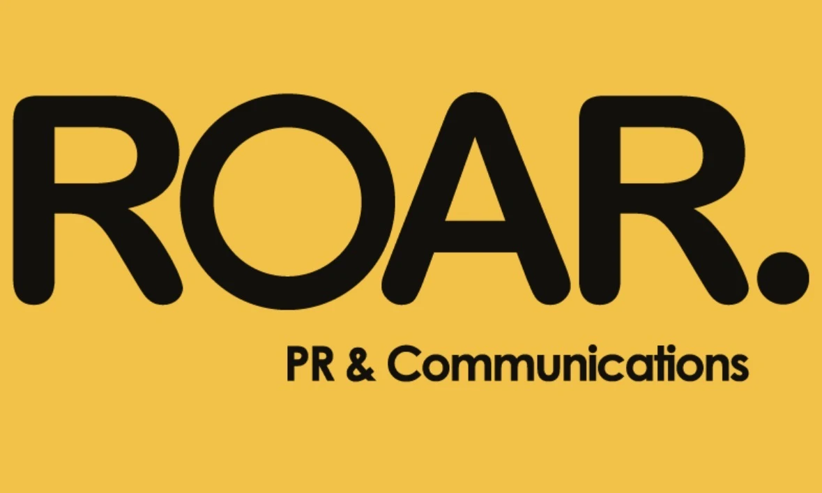 Original ROAR Sales and Marketing logo in yellow on black