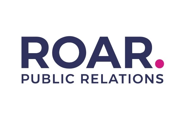 Redesigned ROAR wordmark with fine white lettering and magenta accents on navy